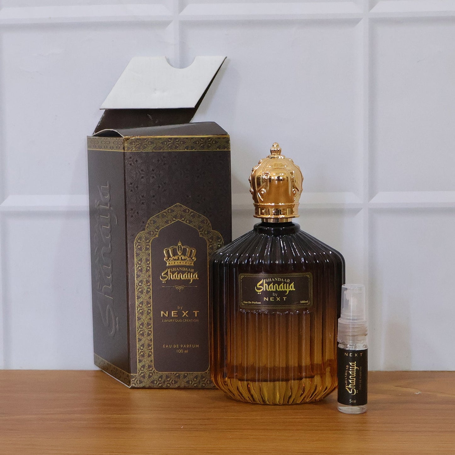Premium Next Shanaya Oud perfume bottle with its distinct scent.