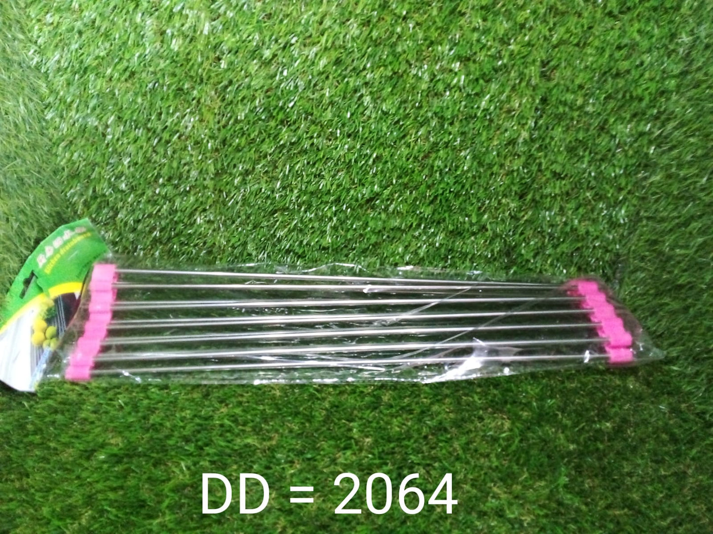 Foldable kitchen sink rack made of silicone-coated stainless steel, enhancing kitchen efficiency.