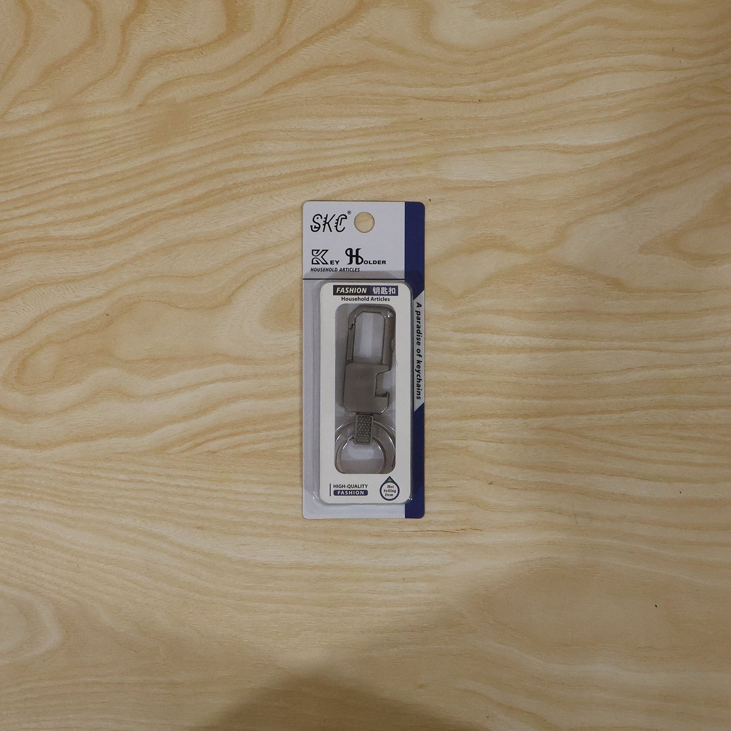 Versatile metal key holder in use, demonstrating its practical application.