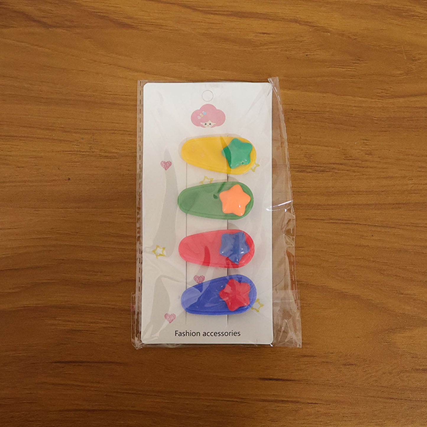 Lifestyle image showcasing colorful star hair clip set in use