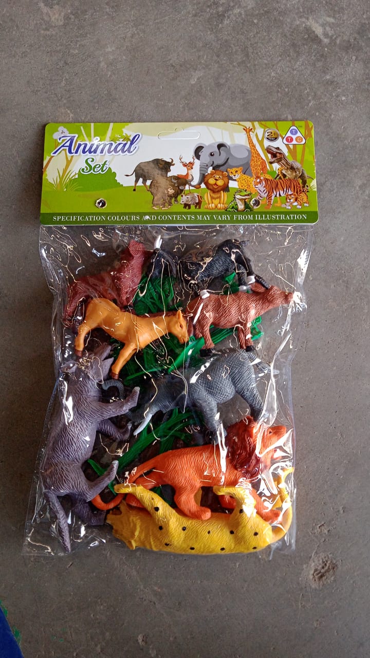Detailed view of plastic wild animal figures from educational Animal Kingdom toy set