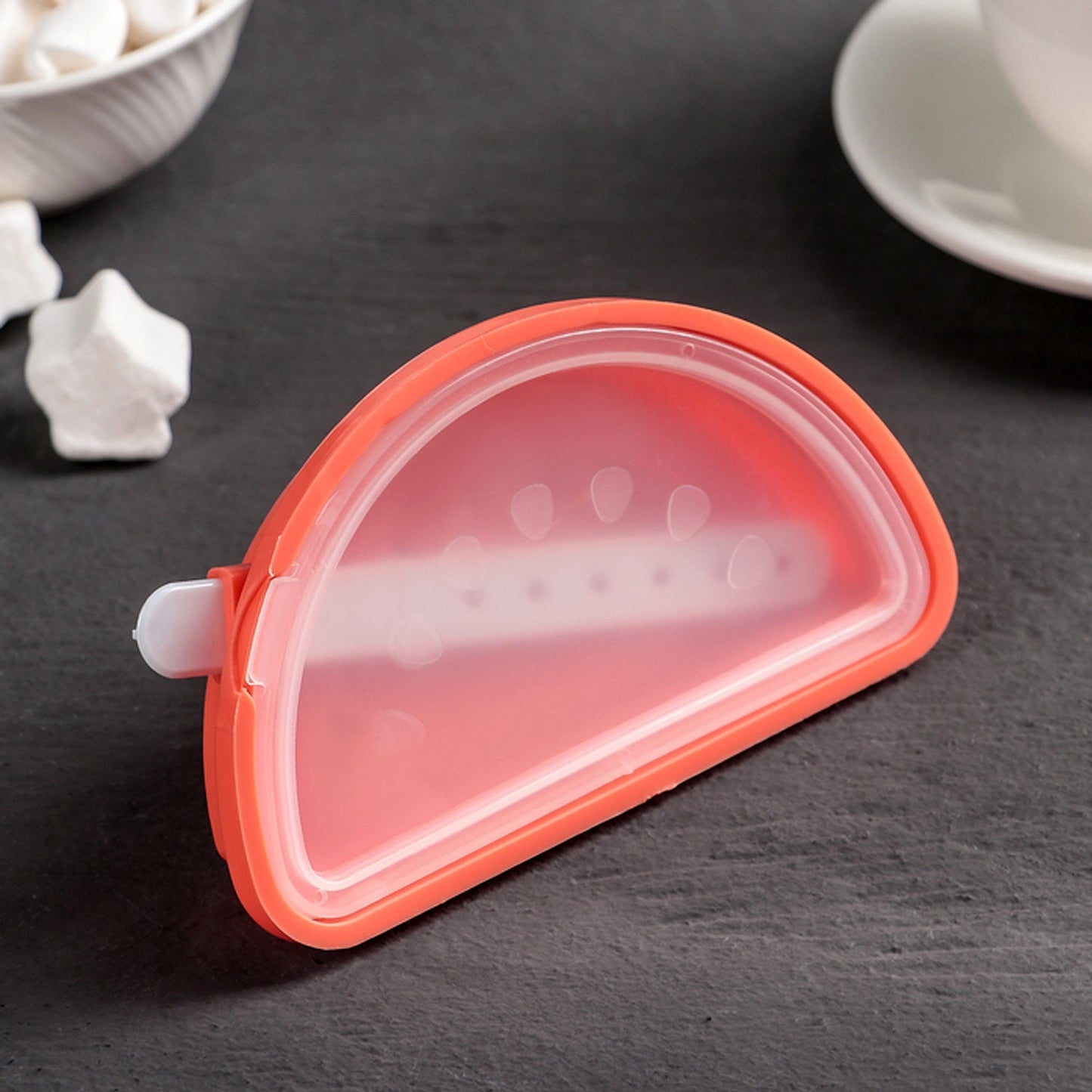 DIY watermelon ice treats being made using the silicone mould.