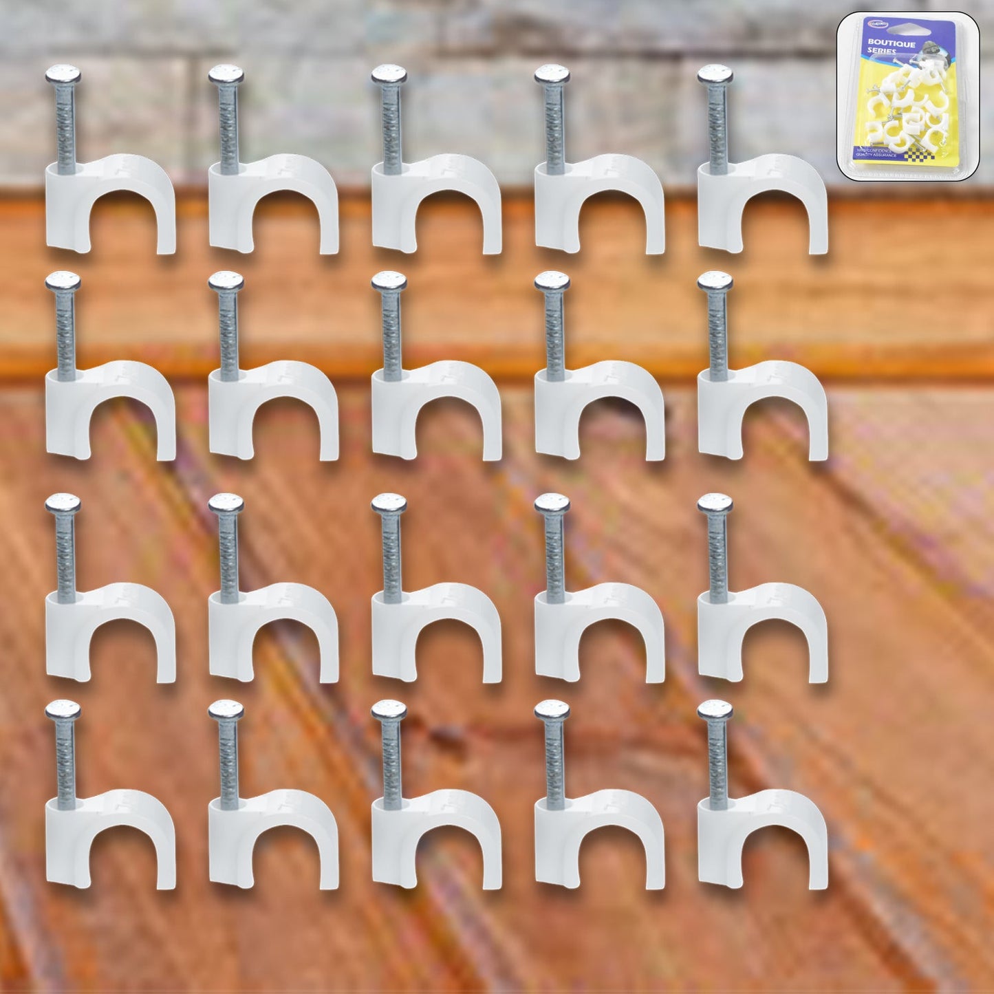 Close-up of steel nail gripping a plastic cable clip for dependable wire holding