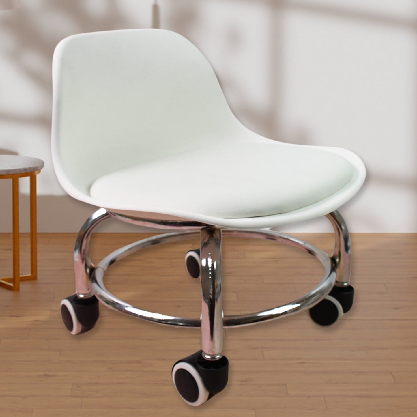 Compact and ergonomic rolling stool with wheels suitable for various home and office tasks.