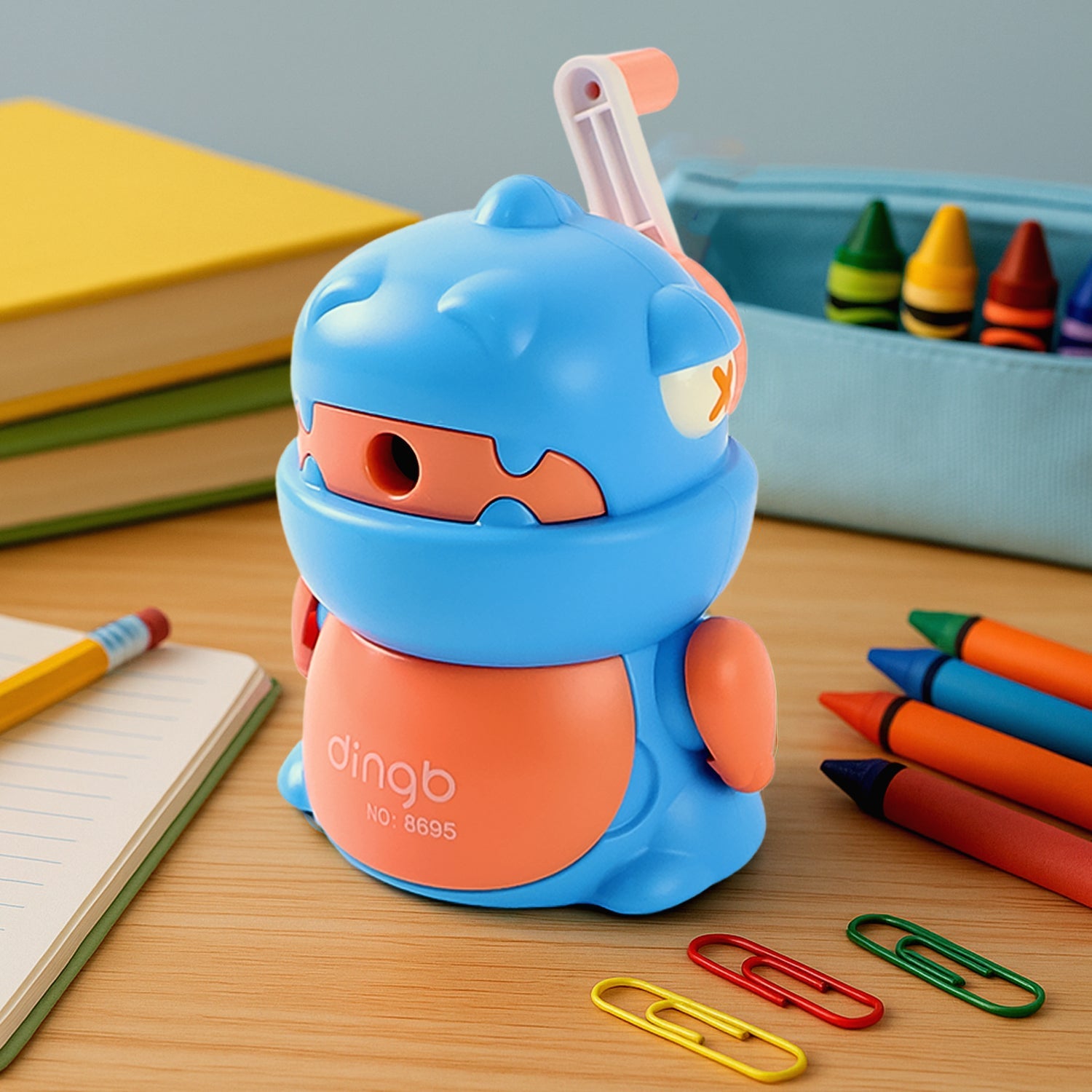Cute teddy shaped kids pencil sharpener in pink with a removable tray.