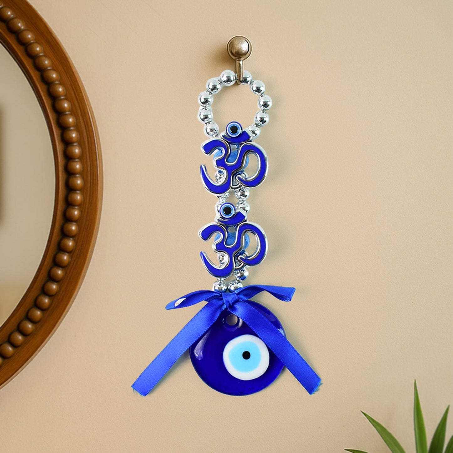Double OM Evil Eye hanging with blue Nazar disc and silver beads