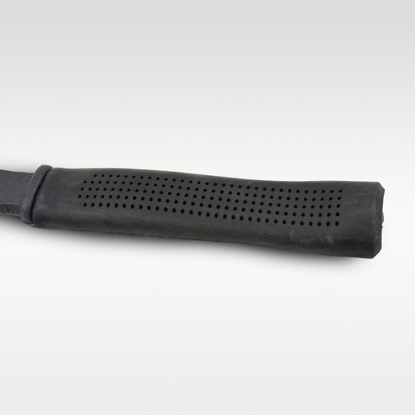 Side view highlighting the sharp cutting blade and pick axe functionality.