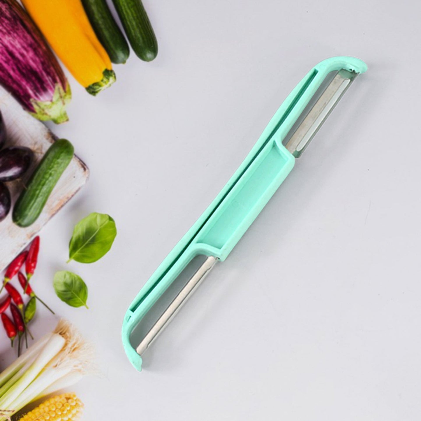 Detailed view of double edge cutter blade on potato peeler