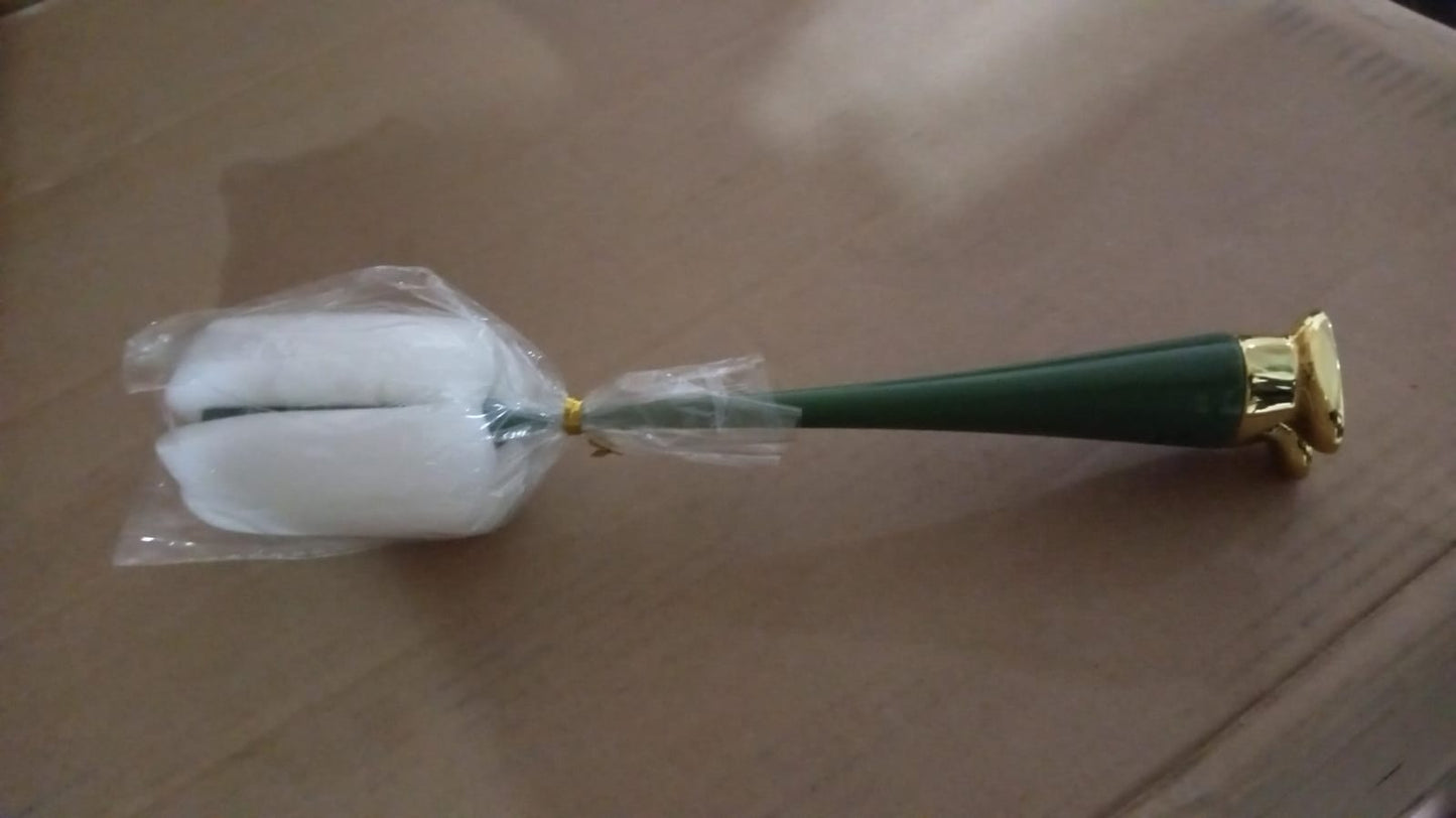 Ergonomic long handle bottle brush demonstrating its reach into a narrow-necked bottle.