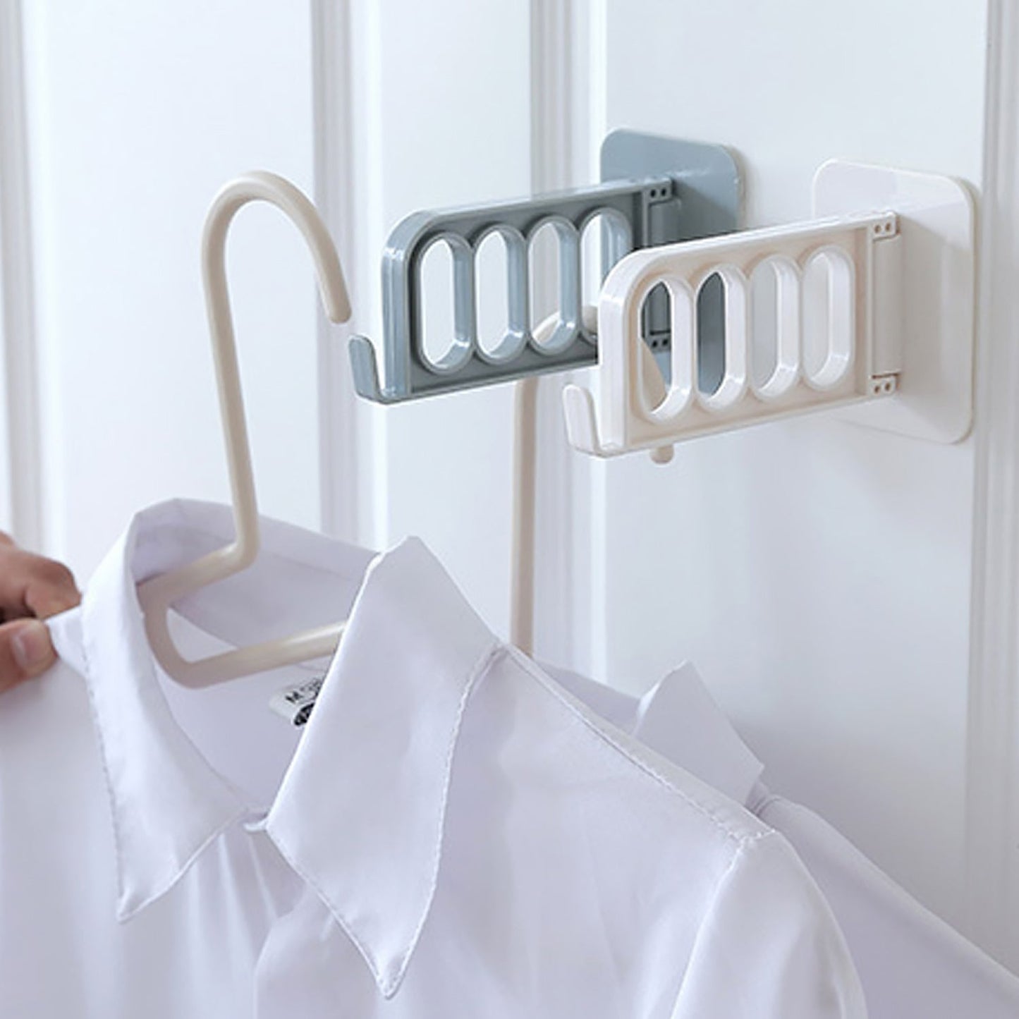 Simple single door hook, perfect for hanging items in bathroom or kitchen.