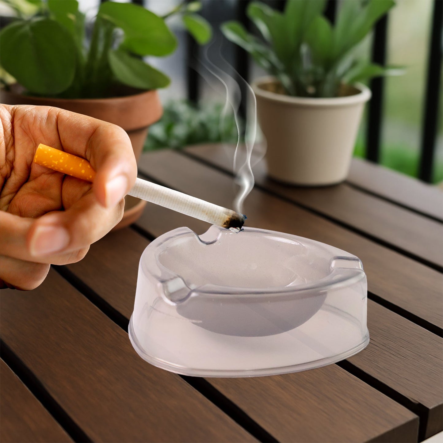 Modern transparent white ashtray ideal for indoor and outdoor use