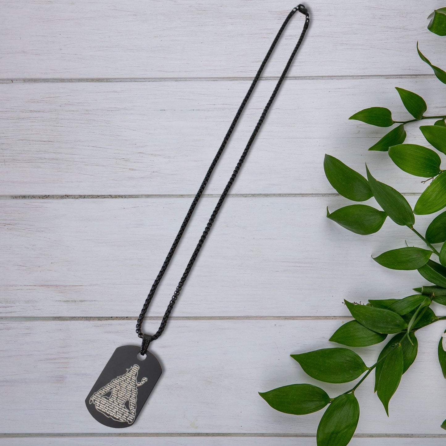 Stainless steel Shiva pendant worn by a man, showcasing its elegant fit and spiritual significance.