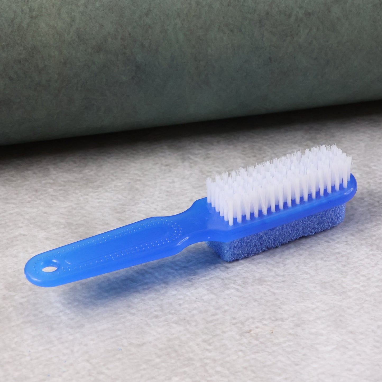 Full view of foot scrubber brush with ergonomic handle for easy grip