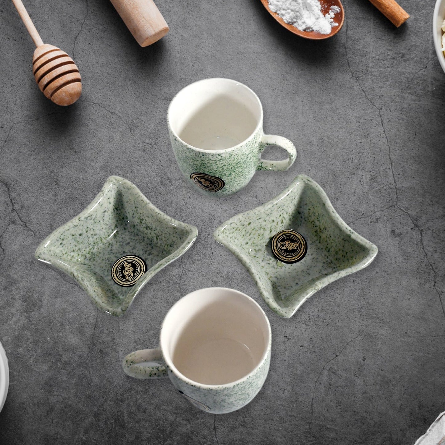 A person enjoying chai and snacks with the versatile ceramic tea and coffee cup set.