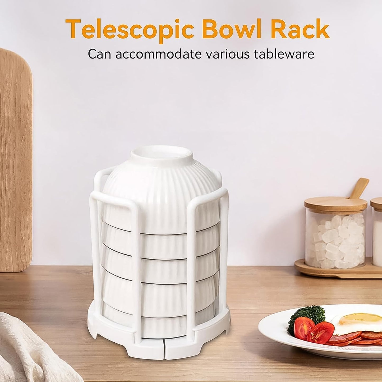 Close-up of the plastic kitchen bowl rack with air-drying dishes, showing drainage design.
