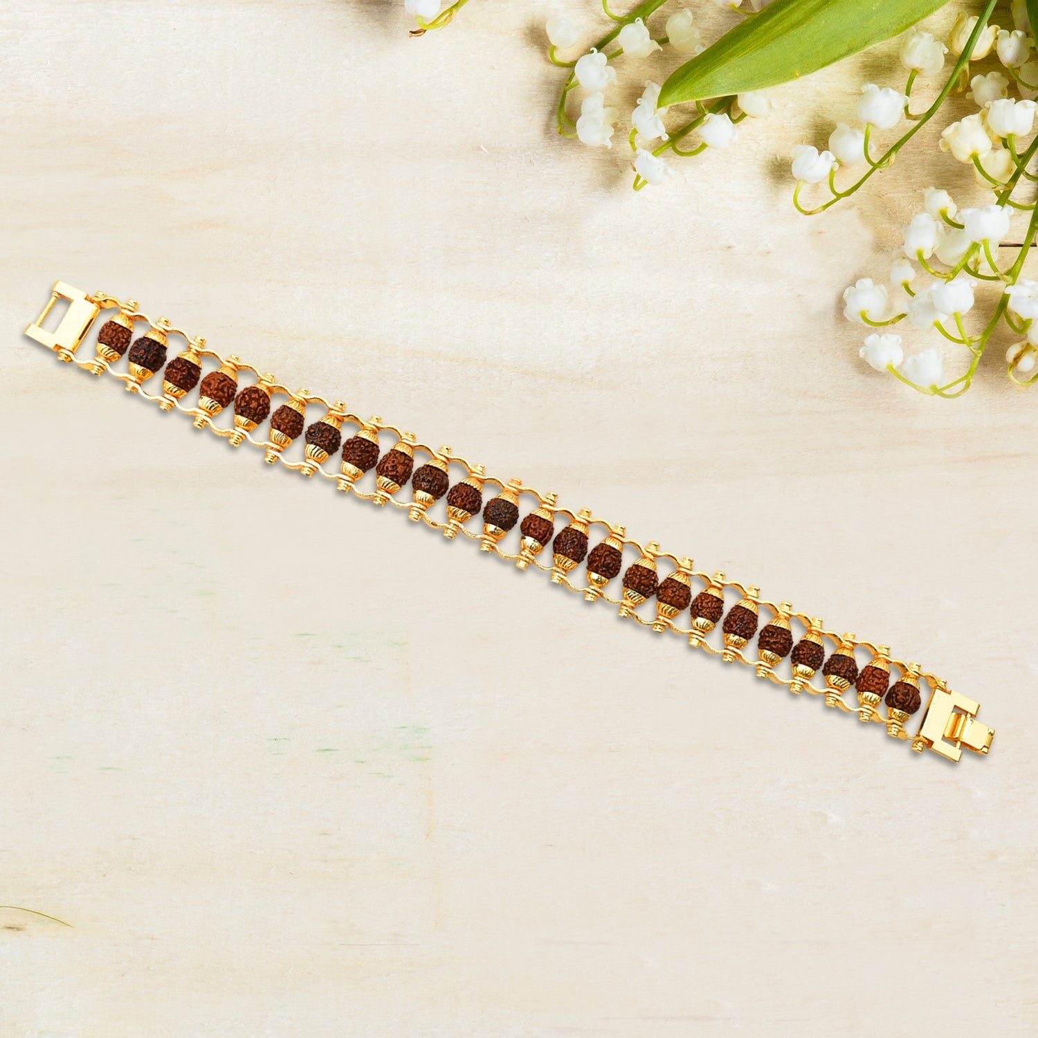 Side view of the Golden Rudraksha Bracelet, showing its profile and comfortable fit.