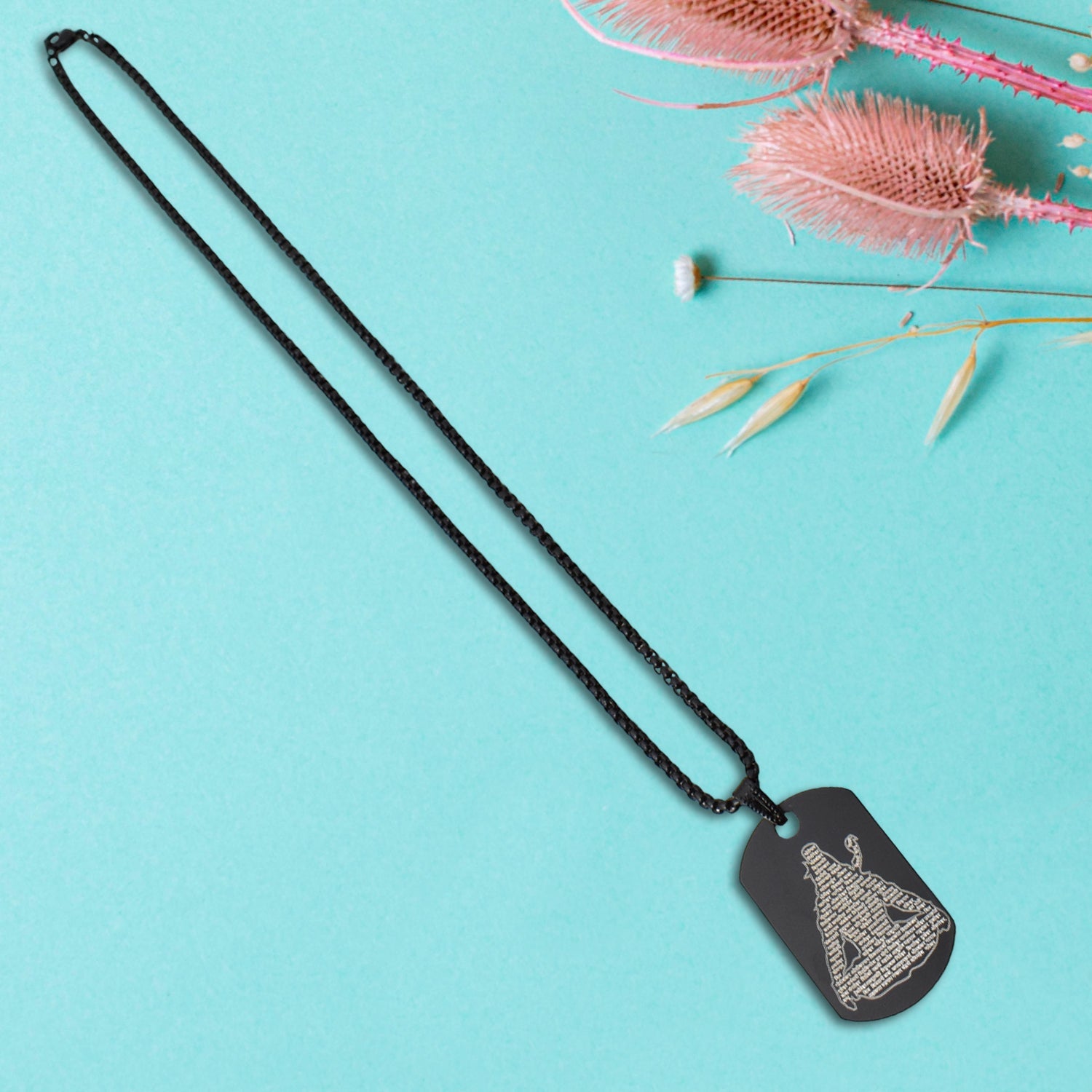 Matte black gift box packaging for the Mahadev Locket, ready for gifting.