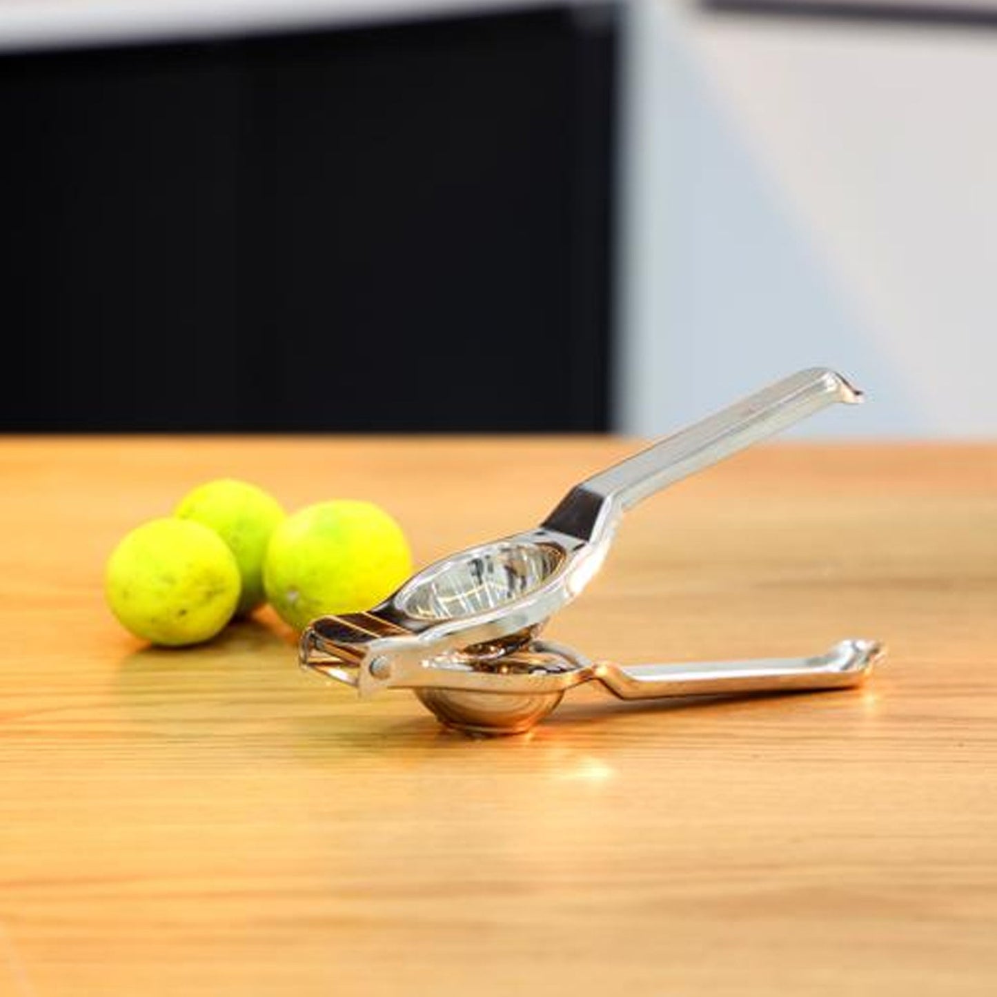Stainless Steel Lemon Squeezer showcasing its non-slip handle design for comfortable gripping.