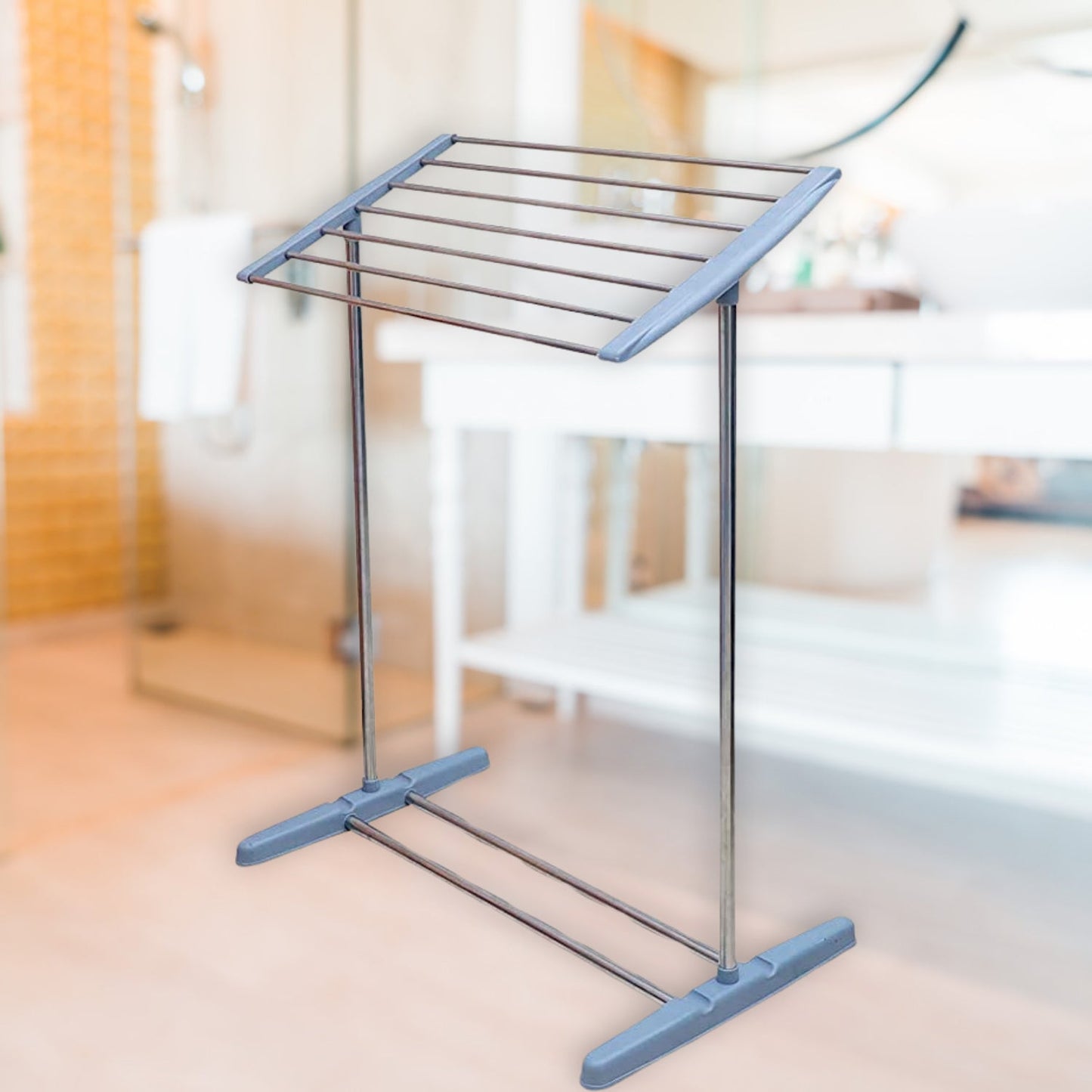 Mobile towel rack positioned indoors, ideal for drying delicate items.