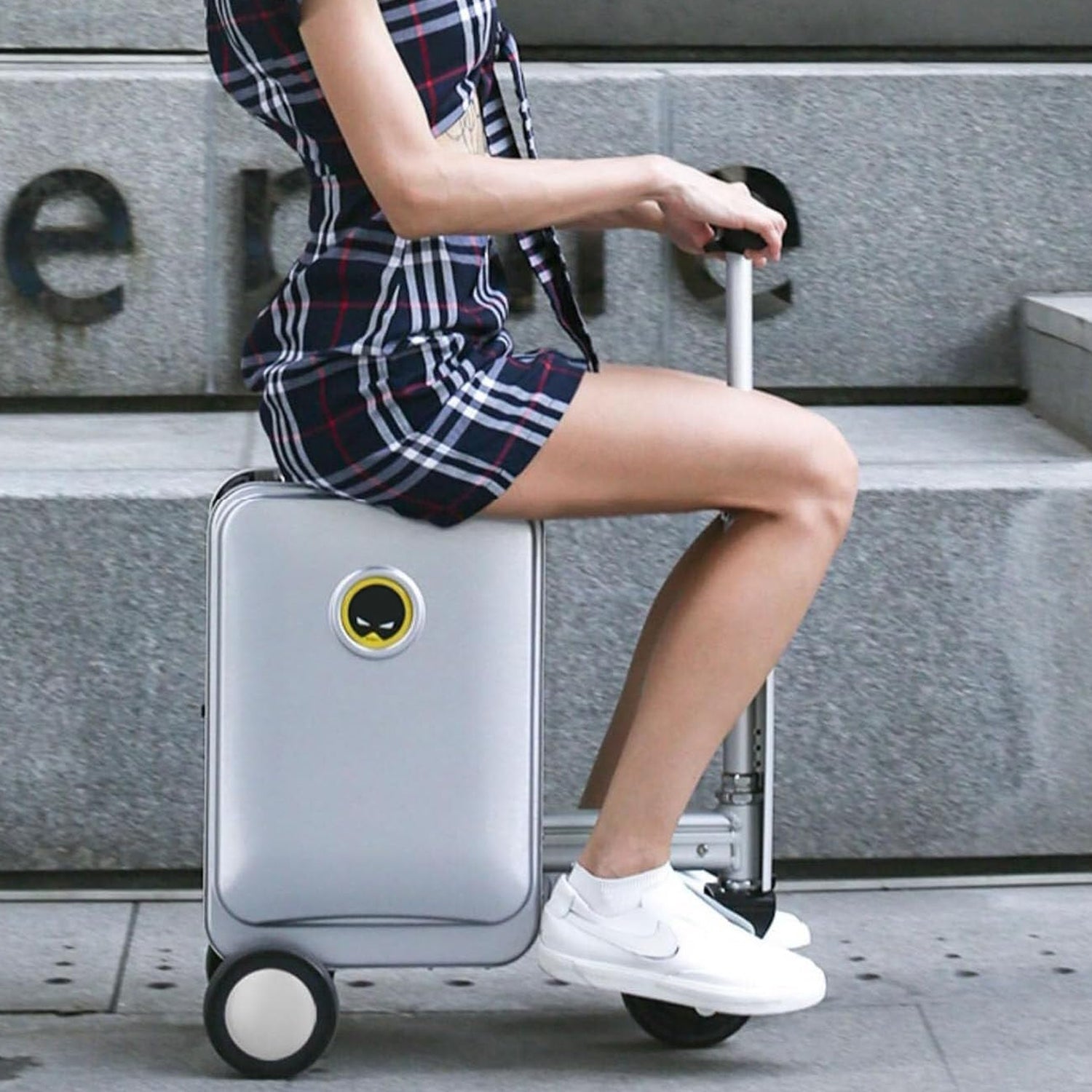 Electric Scooter Suitcase in a modern airport setting, ready for smart travel.
