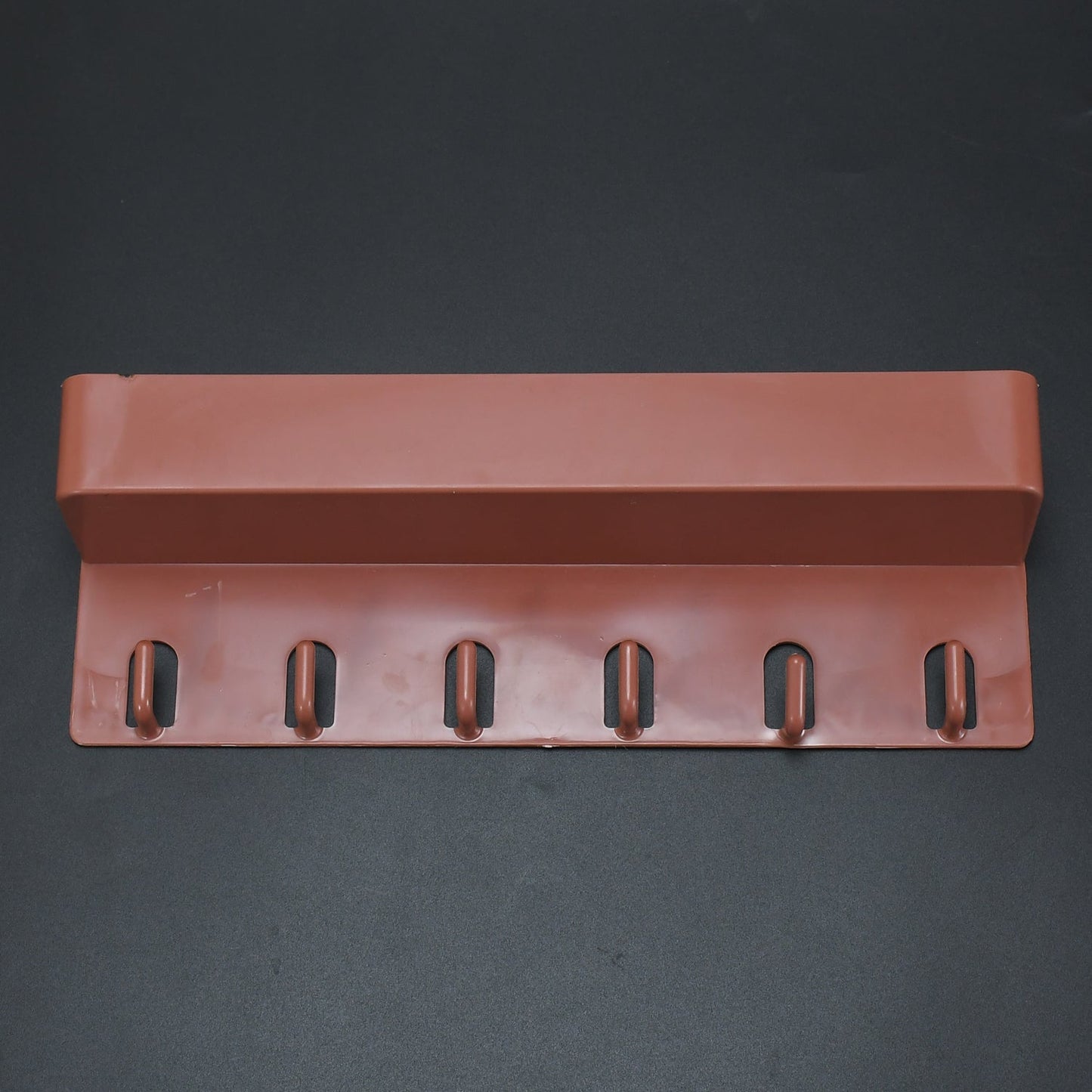 Angled view of the multi-use Key Holder Stand displaying its sleek design and ample space for organization.