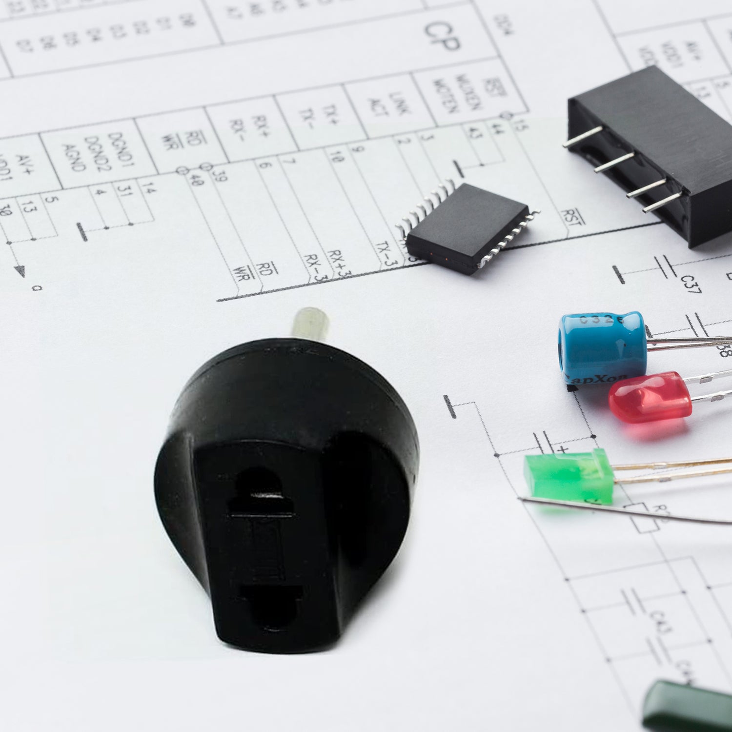 The 2 Pin Plug Adapter displayed with its retail color box packaging.