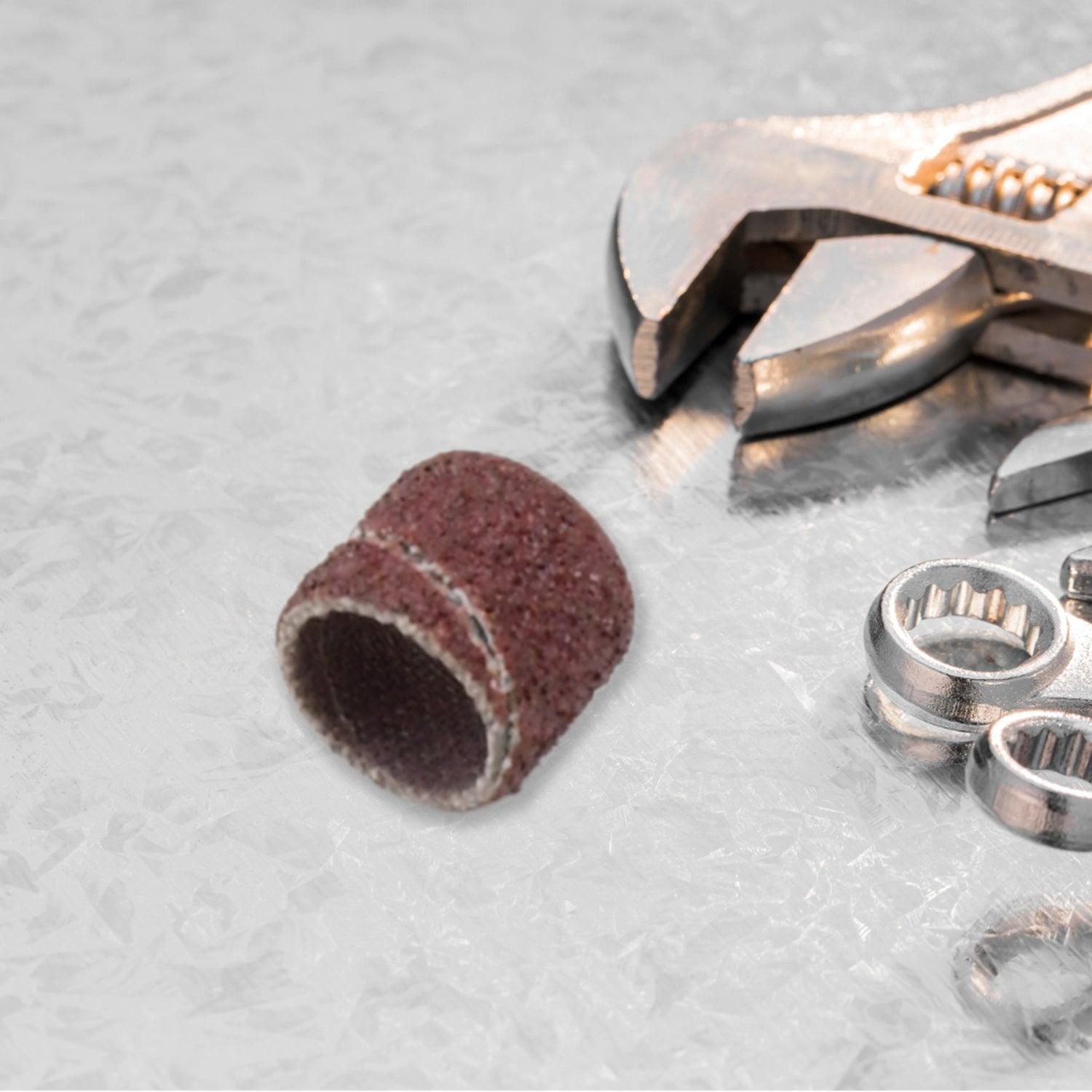 Various sizes of drum sanding sleeves suitable for different polishing tasks.