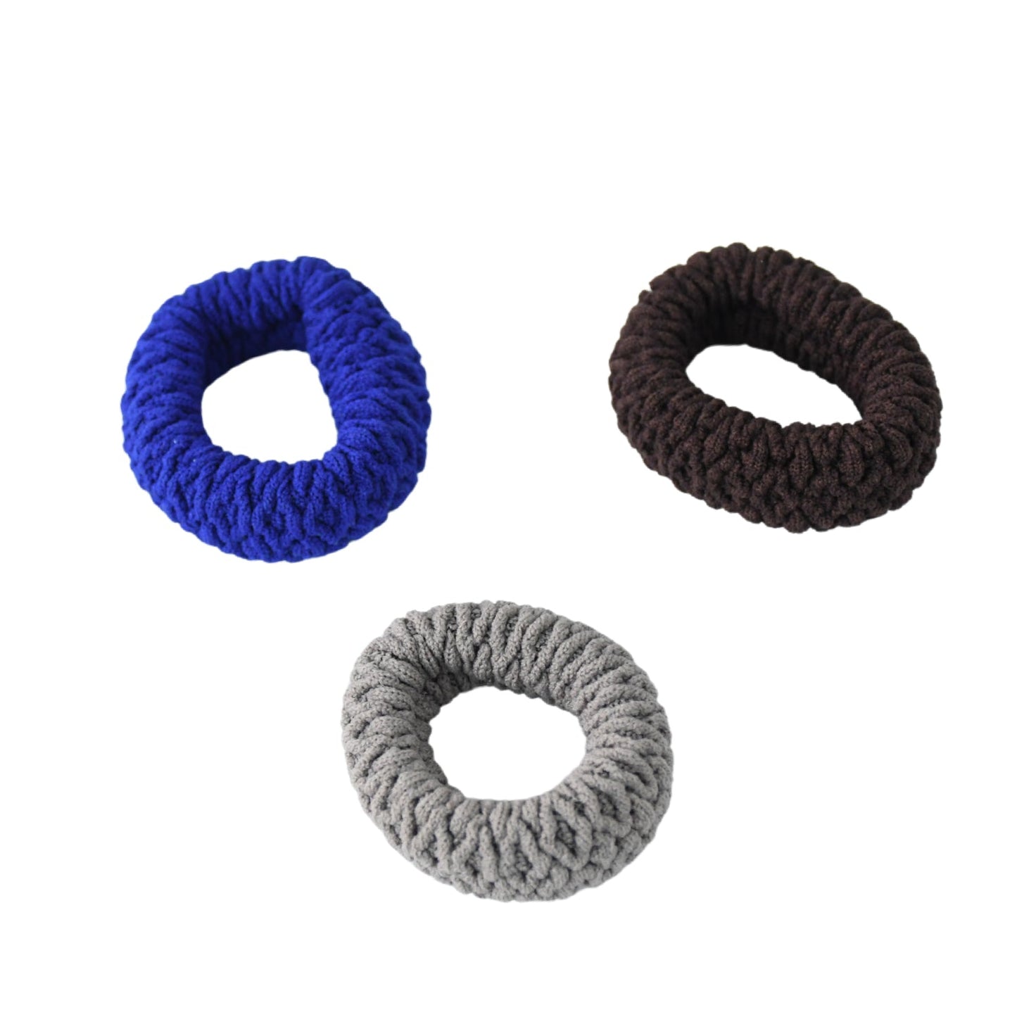 A widened tyre shape hair band securely holding a thick ponytail.