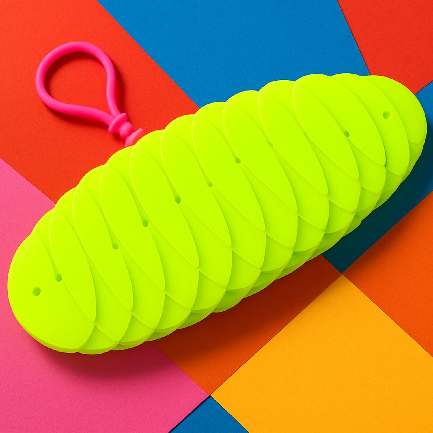 Flexible plastic worm fidget toy in folded shape perfect for sensory relief