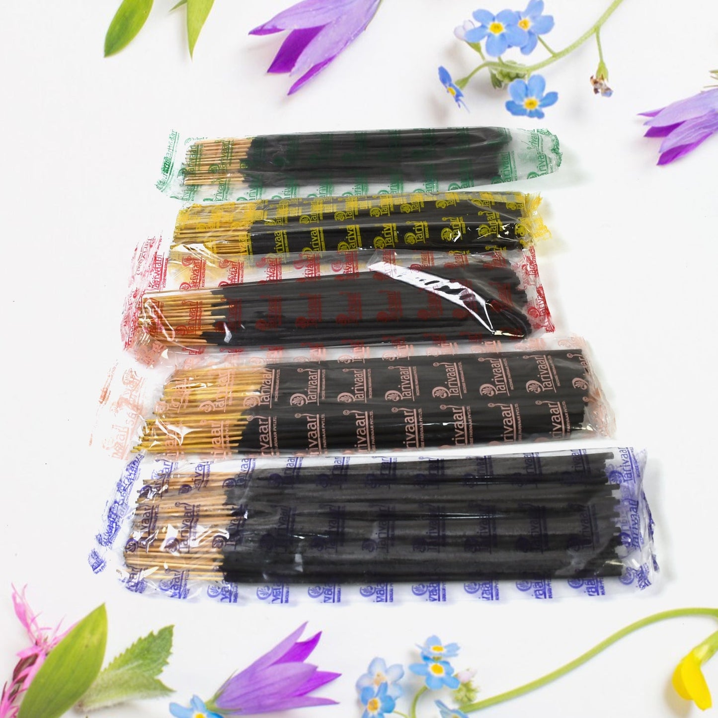 Lit Pancham incense stick releasing fragrant smoke, creating a calming atmosphere.