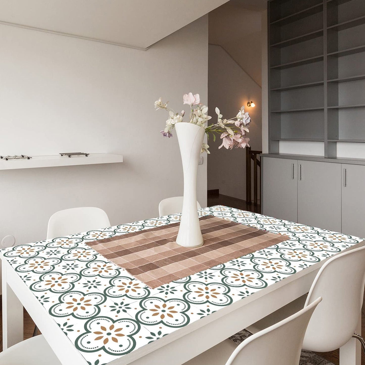 A contemporary kitchen area with a white patterned Peel and Stick Tile backsplash, adding a clean aesthetic.