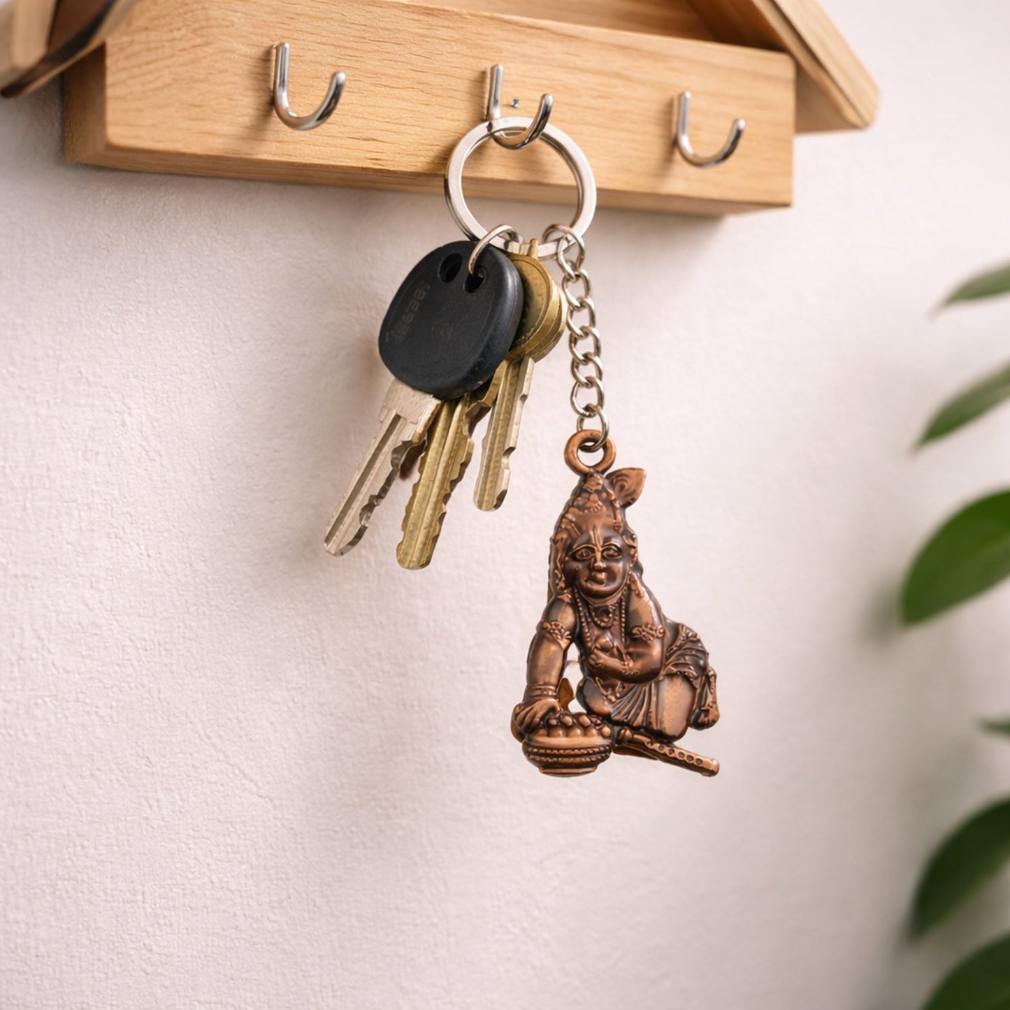 Back view of the Bal Krishna Makhan Chor antique gold keychain