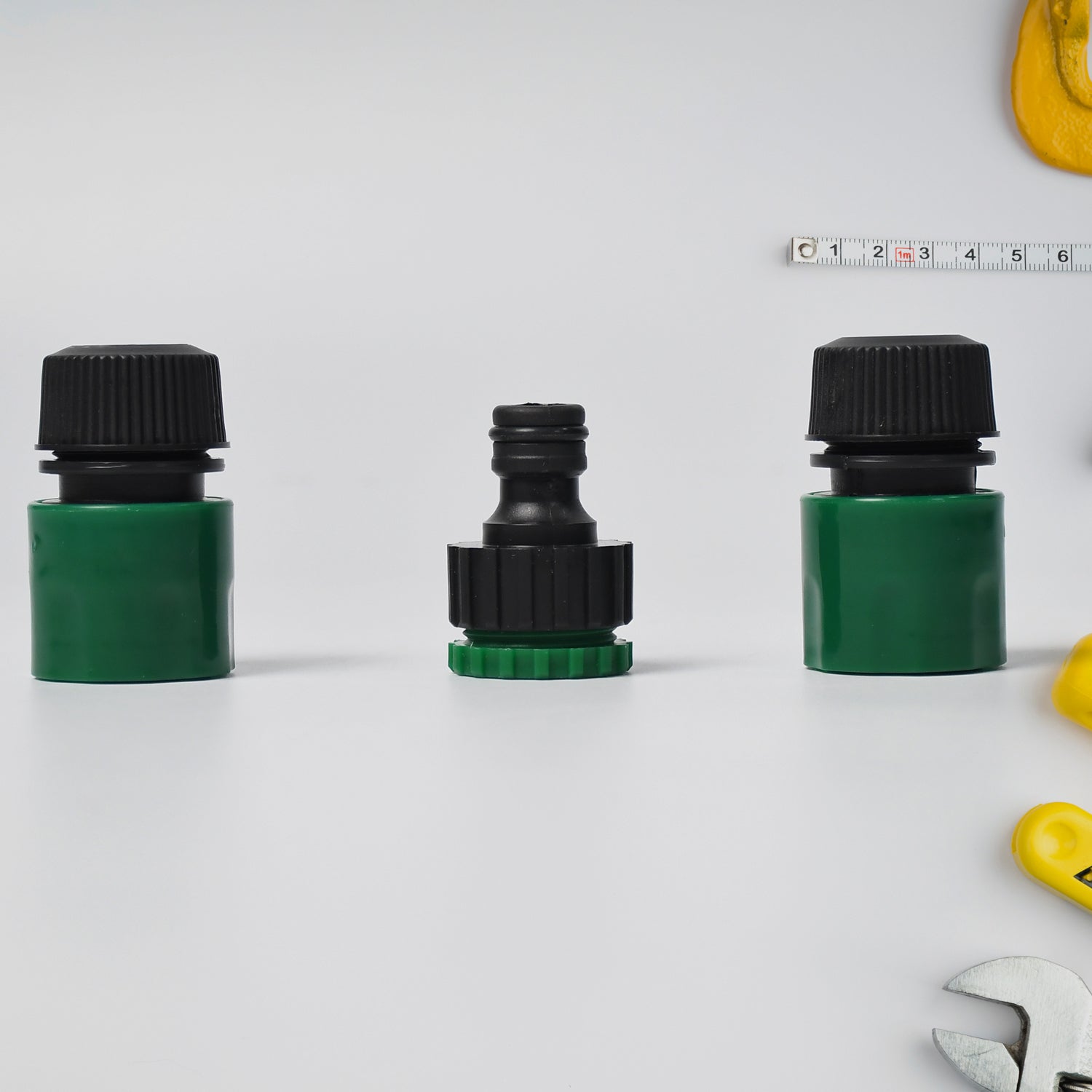 A hose pipe connector shown with the included threaded tap connector.