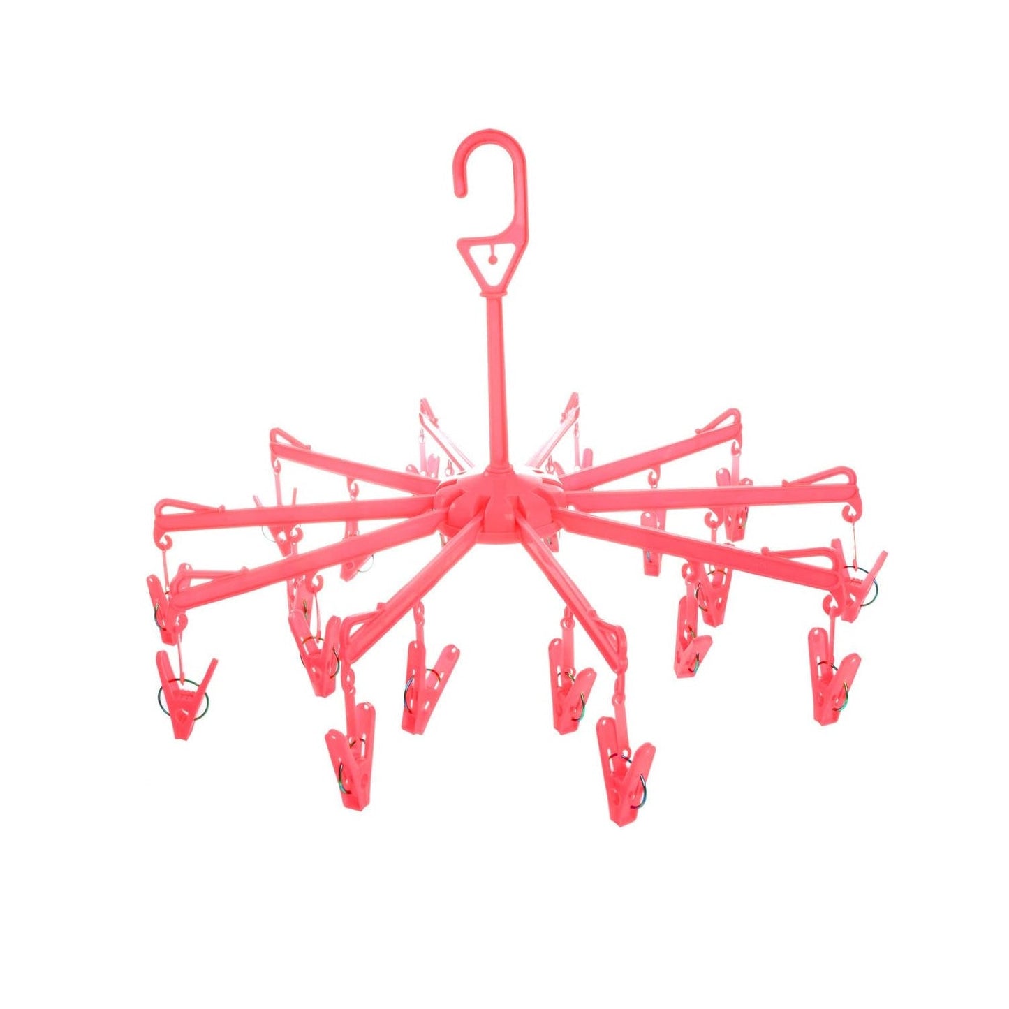 Close-up of the clothes clips hanger securely holding baby clothes for quick drying.