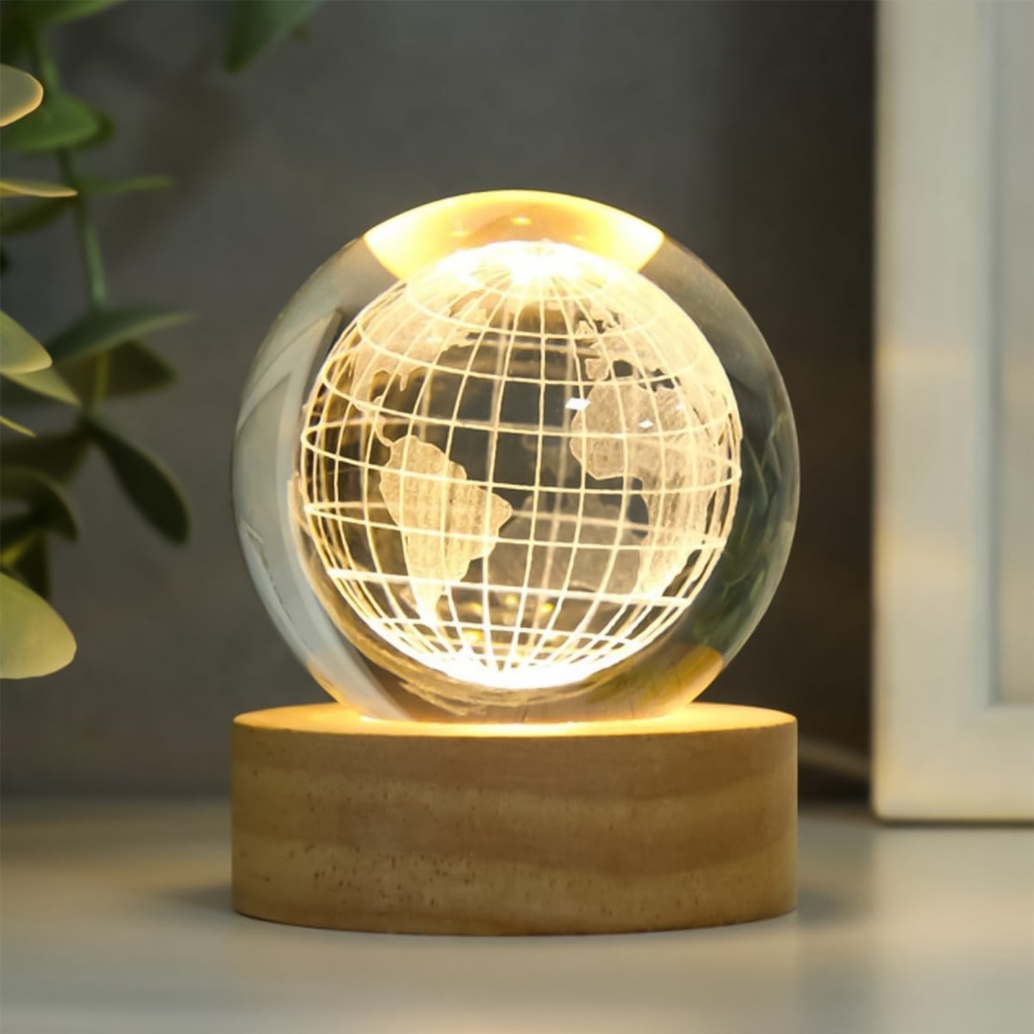 Detailed view of the illuminated crystal sphere, showcasing its captivating 3D design.