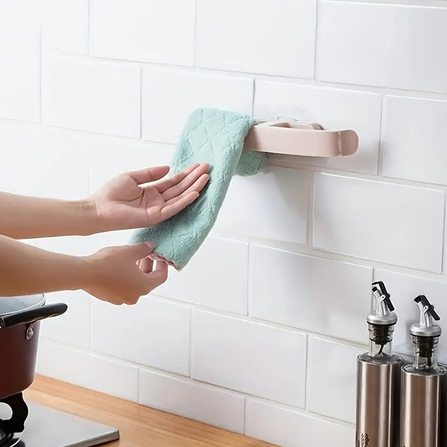 Front view of the multi-functional self-adhesive hanging rack, showcasing its capacity.