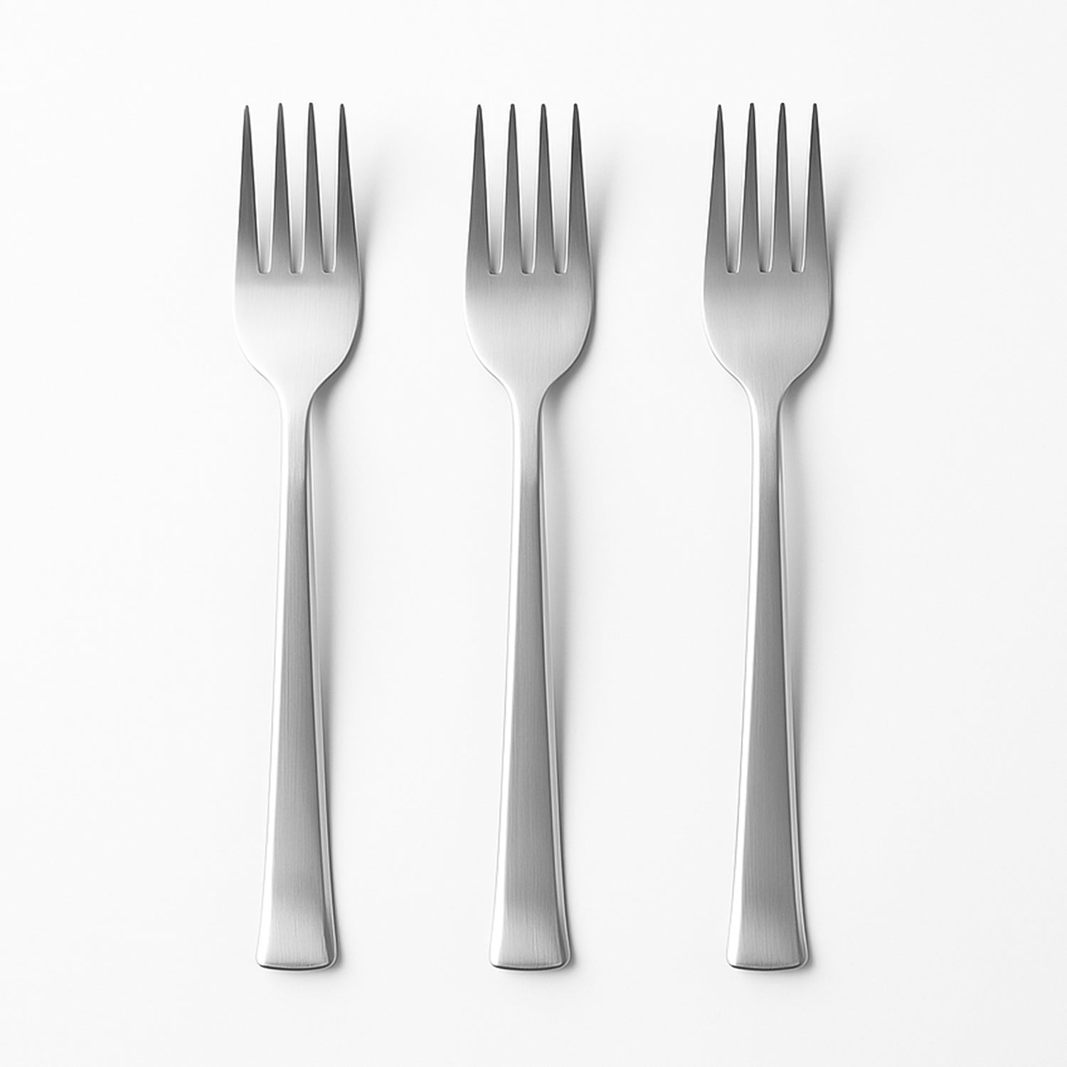 Detailed close-up of the tines of a durable stainless steel dinner fork.