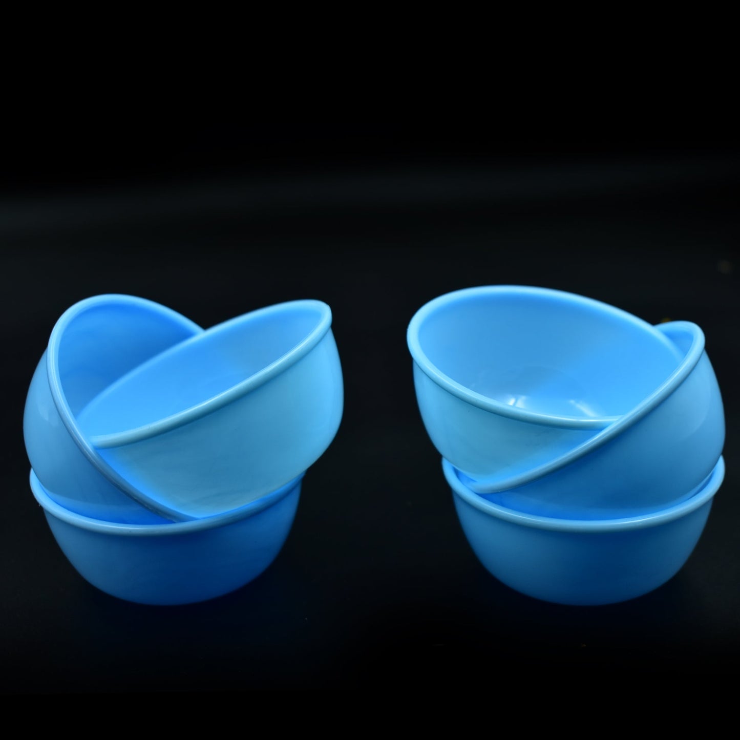 Overhead view of microwave-safe unbreakable plastic bowls in a set of six.