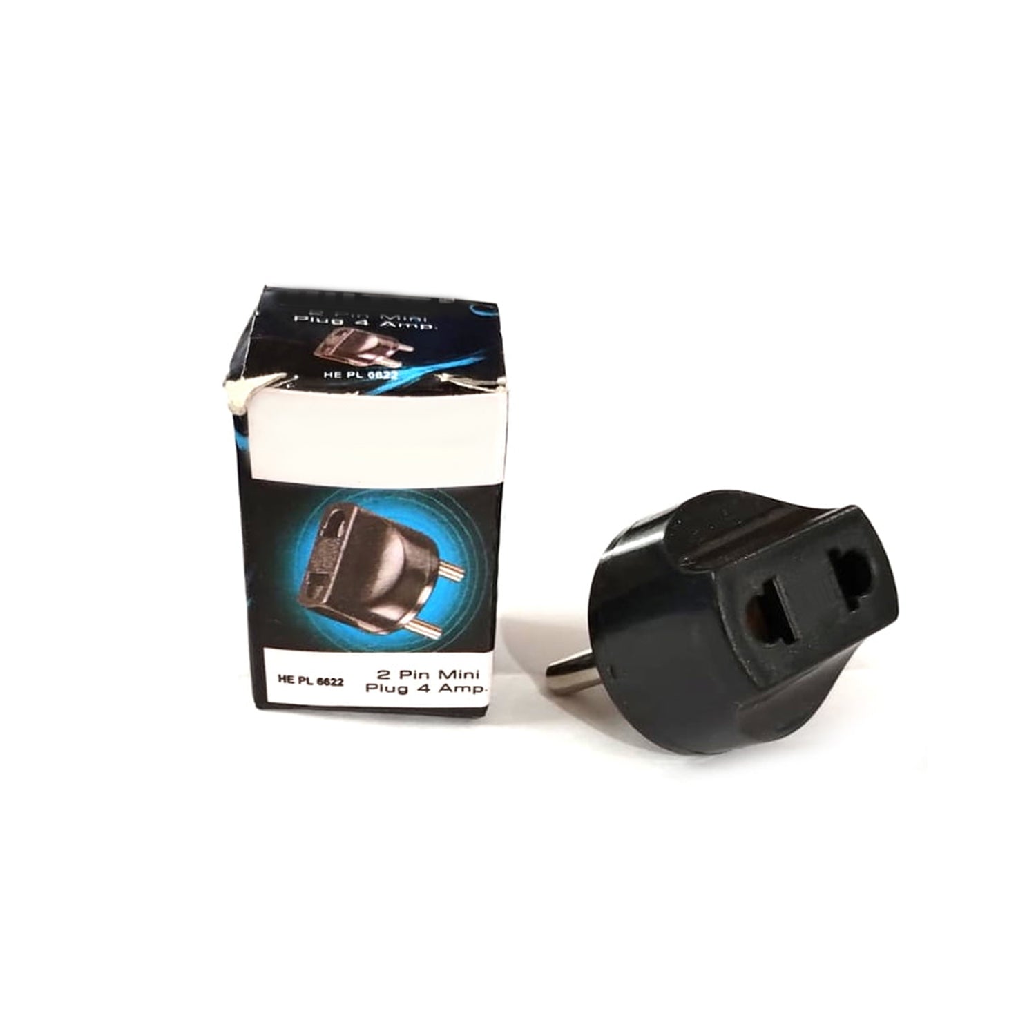 2 Pin Plug Adapter securely inserted into an Indian electrical socket.