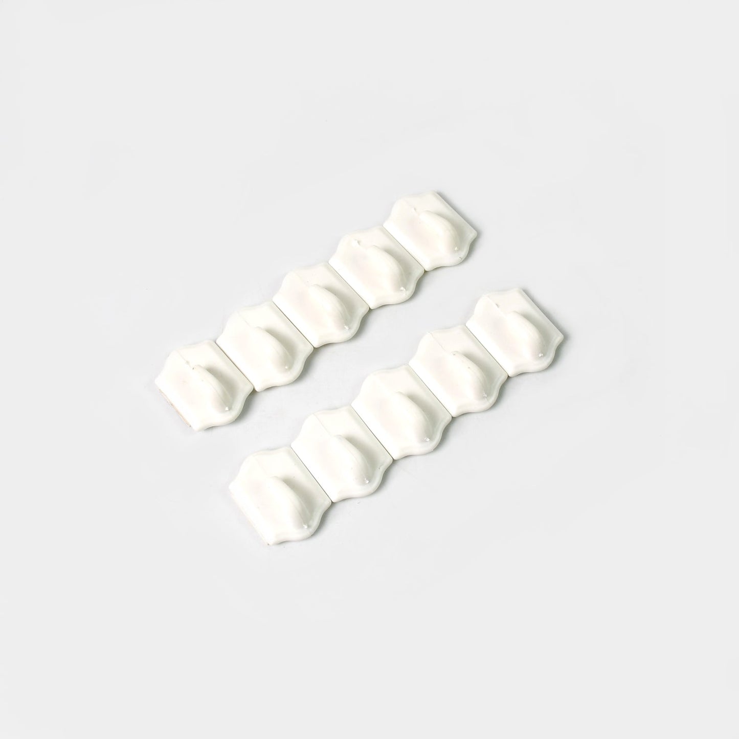Illustration showing easy peel-and-stick installation steps for the adhesive wall hooks.