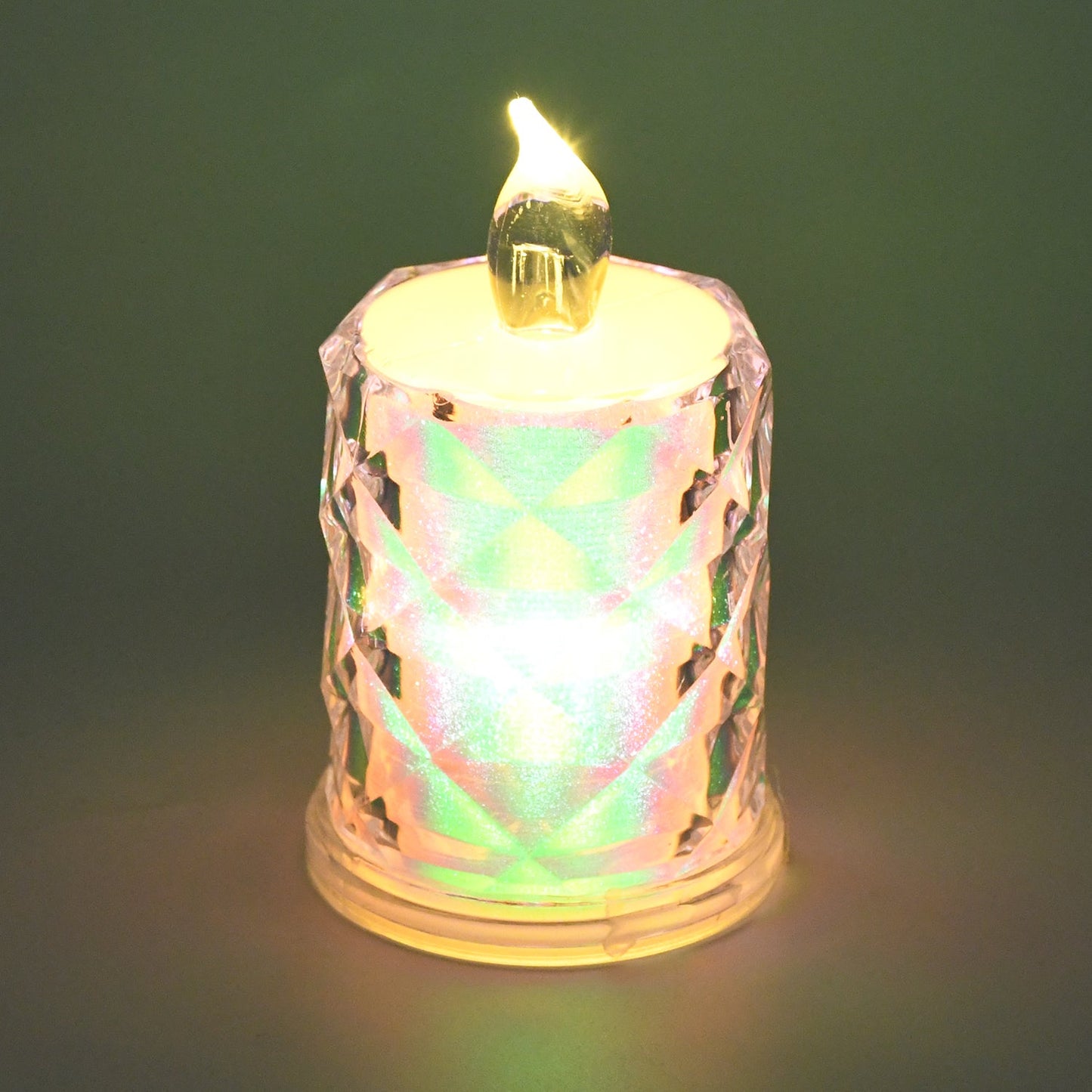 Warm yellow LED tealight candle flickering gently, perfect for festive decor.