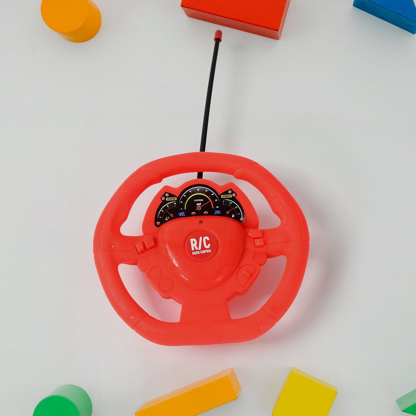 A child's hand guiding the rechargeable RC car across a smooth surface, in action.