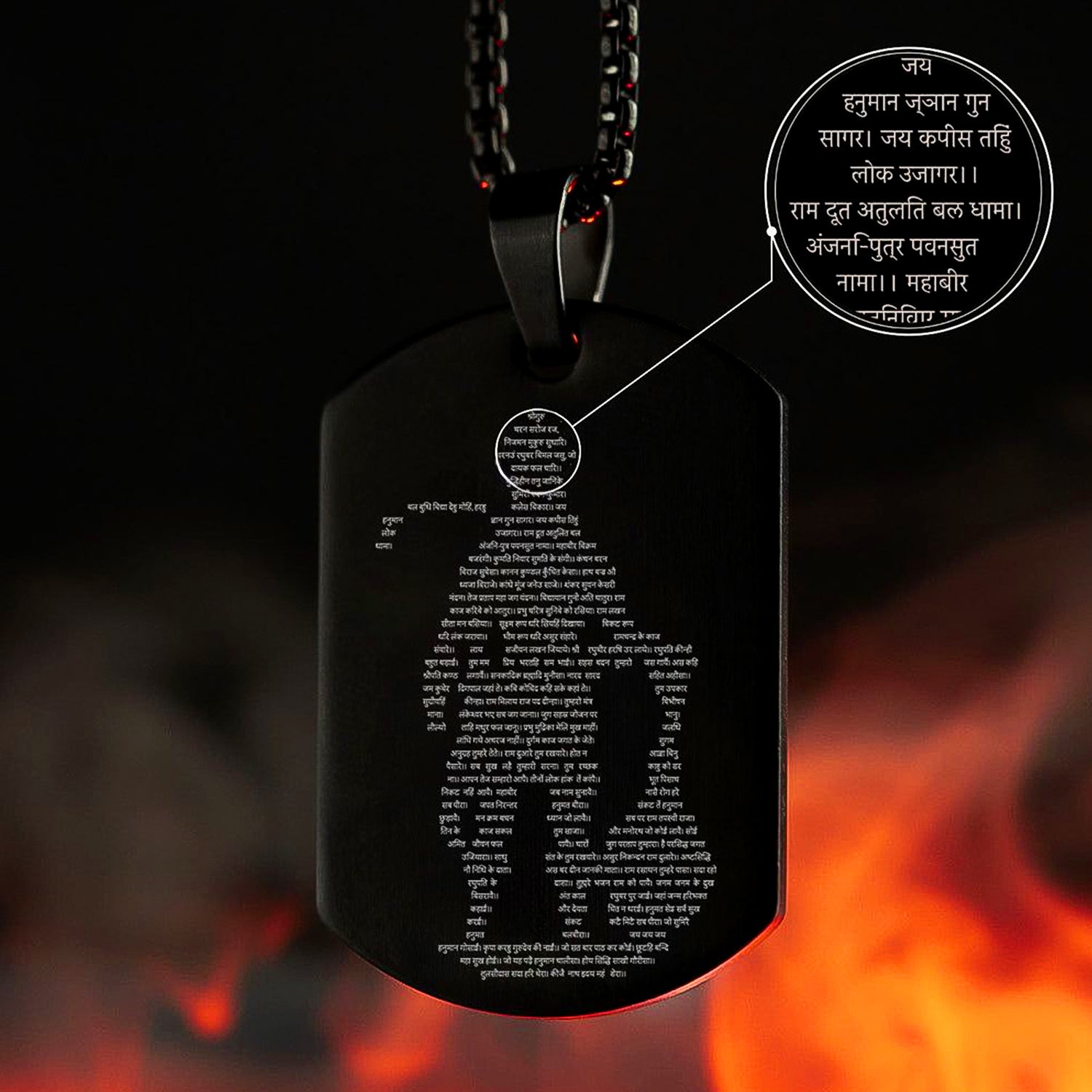 Detailed shot of the Gada micro-carved tag within the spiritual jewellery.