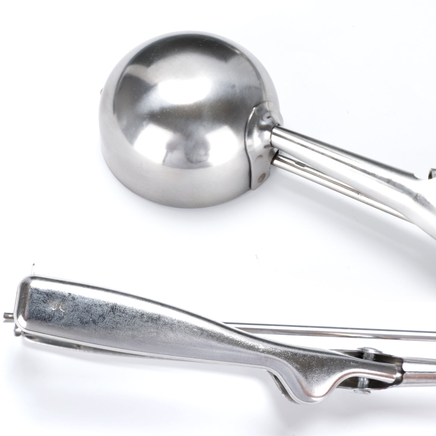 Ice cream scoop placed on a kitchen counter, ready to serve.