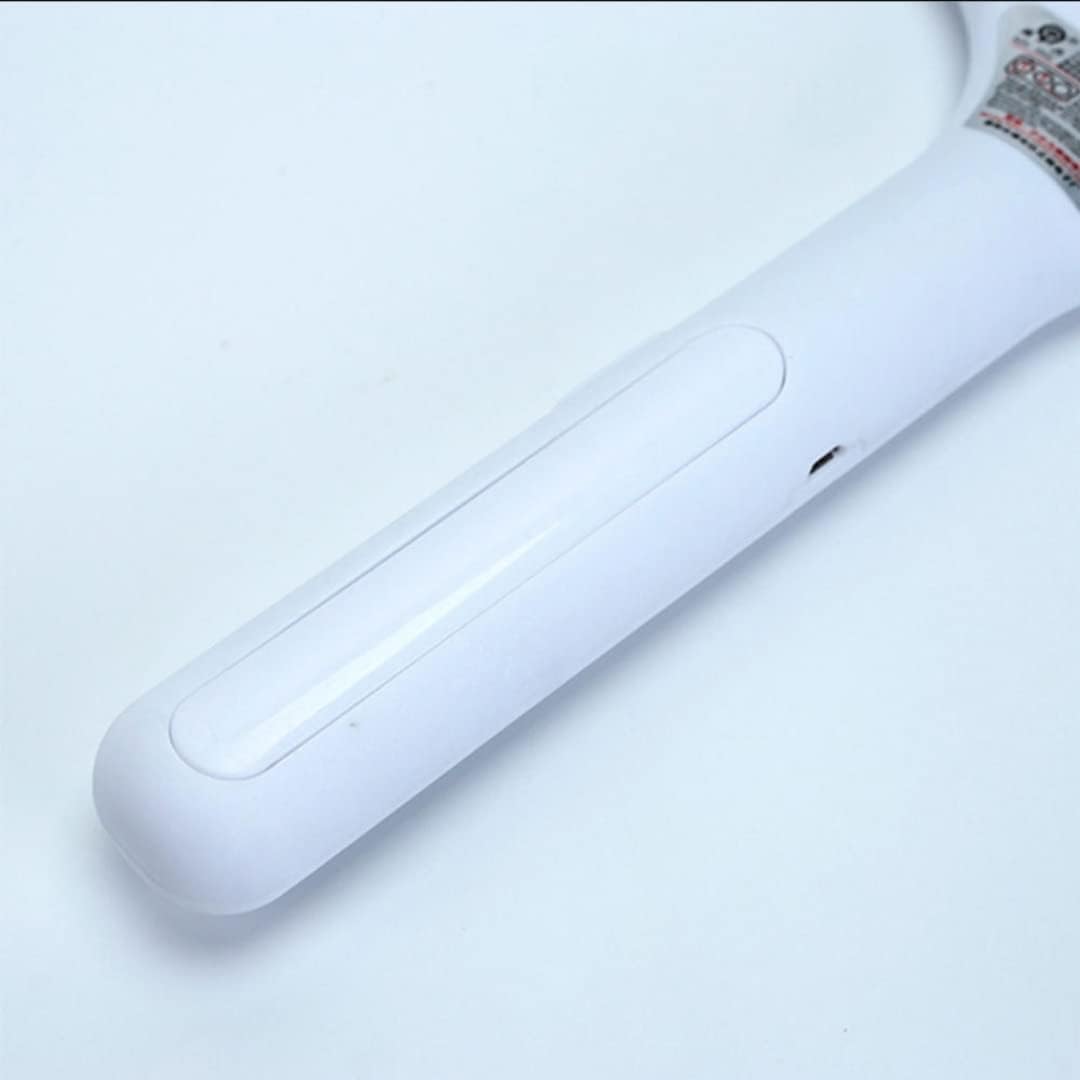 A close-up view of the smooth, white handle of the mosquito killer racket against a plain white background.