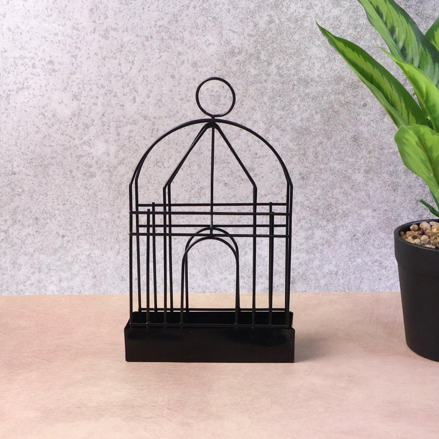 Birdcage design mosquito coil burner suitable for both indoor and outdoor settings.