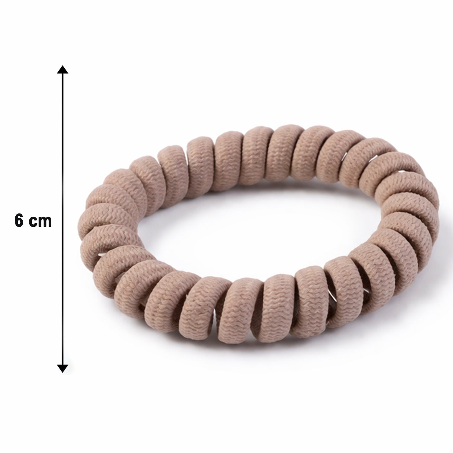 A single spiral coil hair band presented on a flat surface.