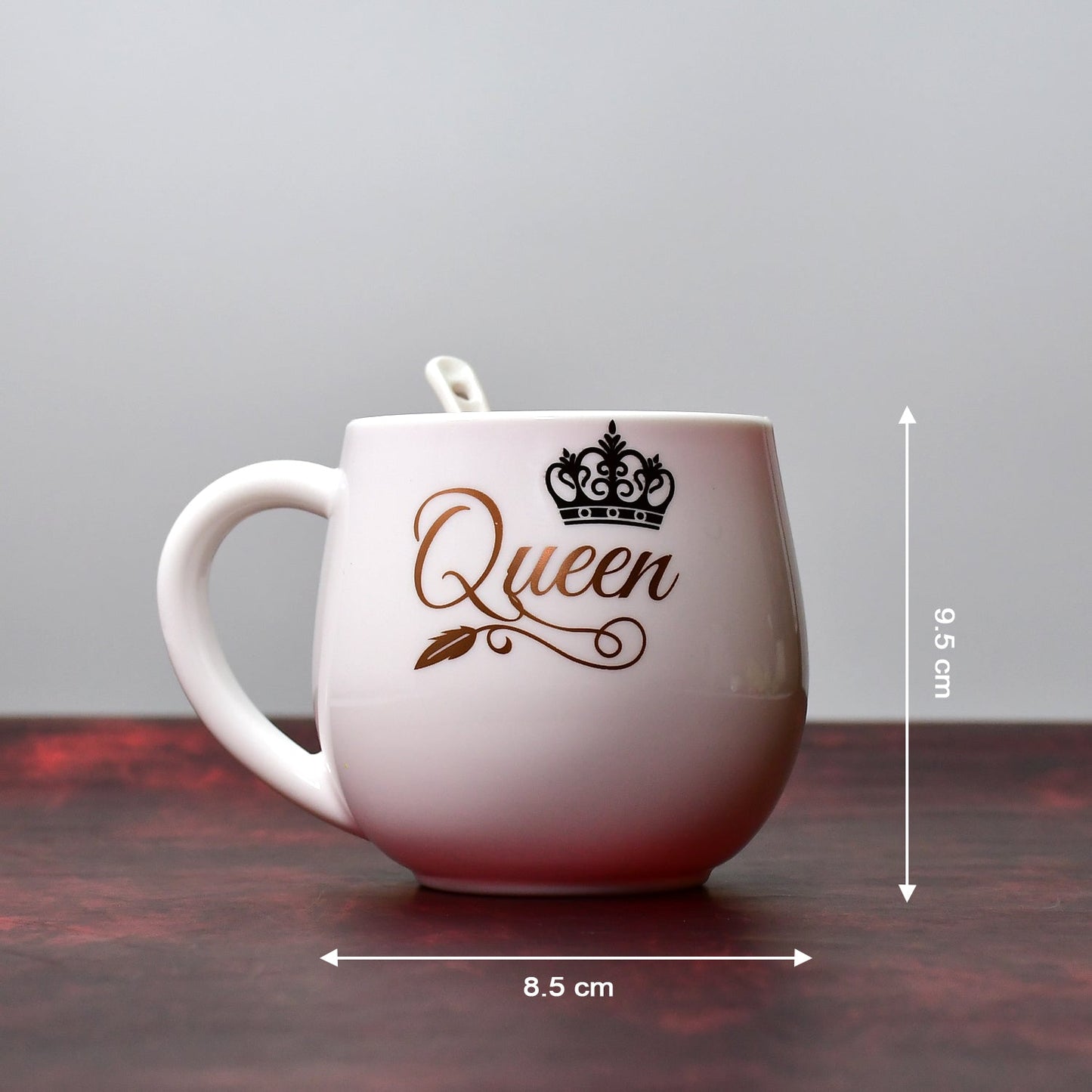 Boxed multi-design plastic mug with spoon, perfect for gifting.
