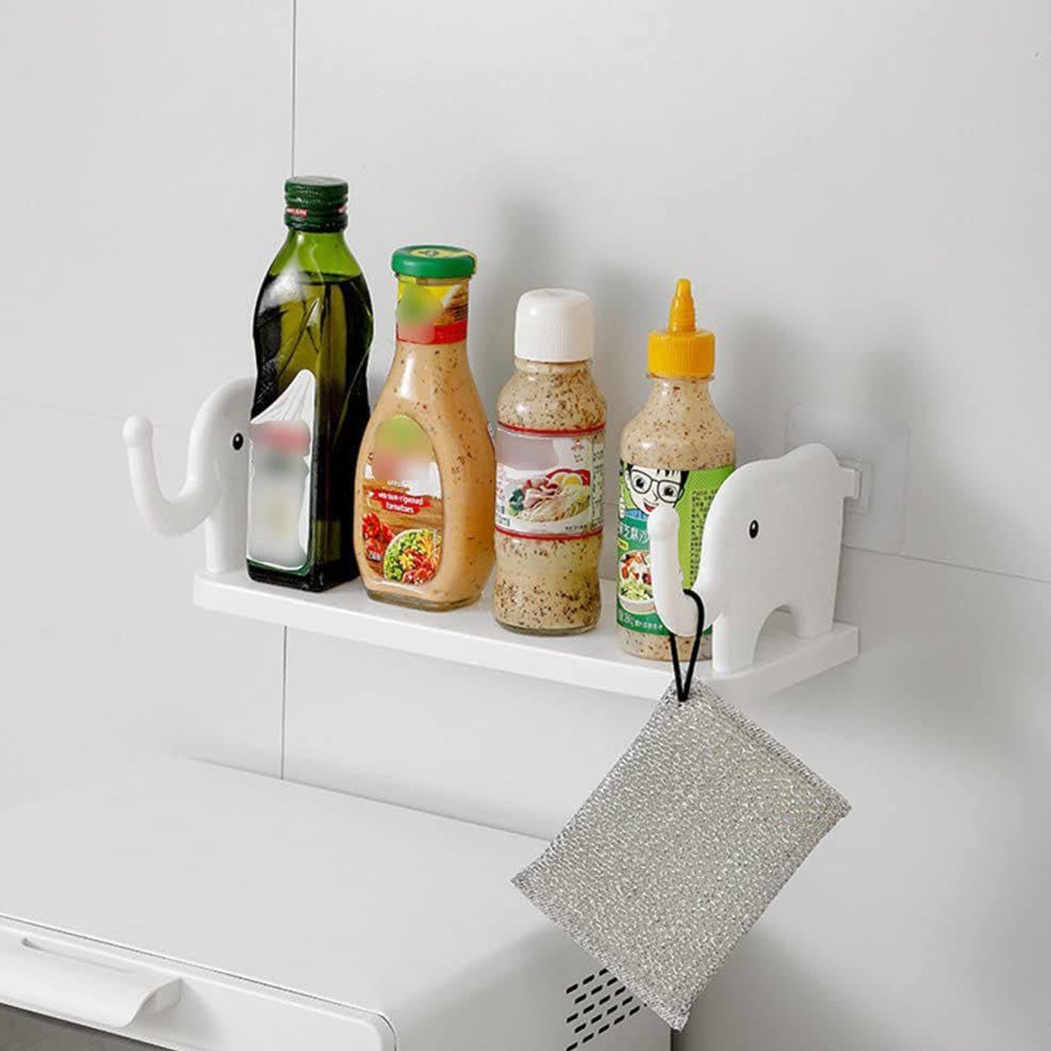 No-punch elephant wall shelf providing storage in a modern bathroom.