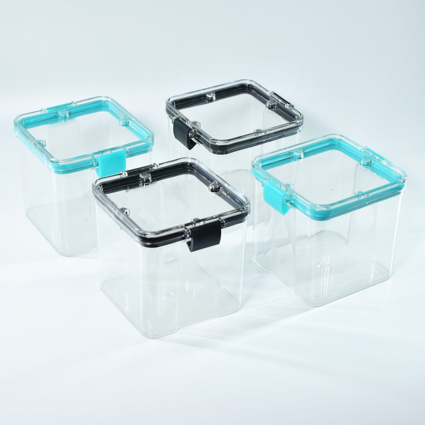 A set of four 700ml plastic food storage containers, perfect for storing dry goods.